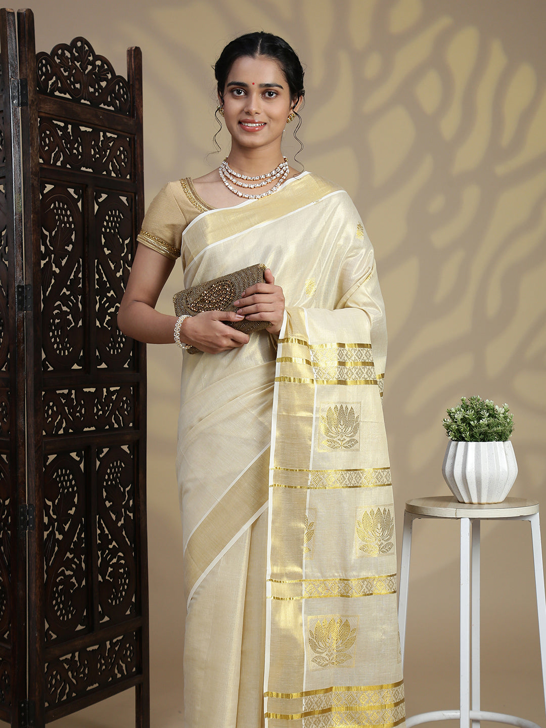 Women Traditional Kerala Tissue Gold Saree KS230
