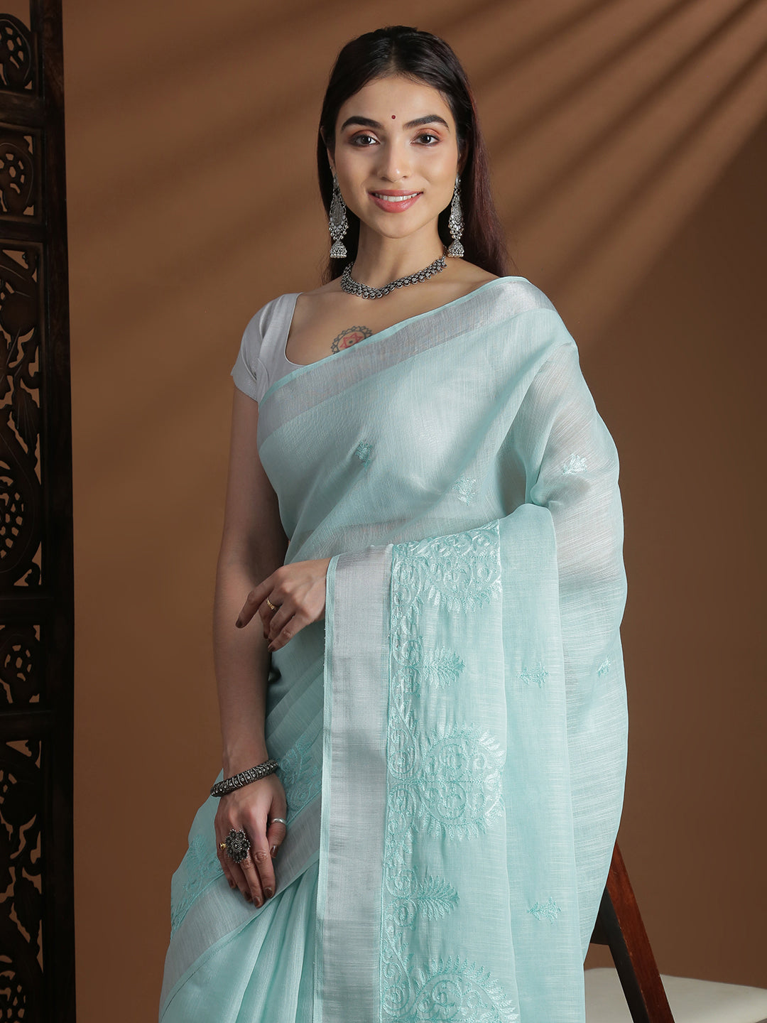 Women Mint Blue Semi Linen Embroidered Saree SL239