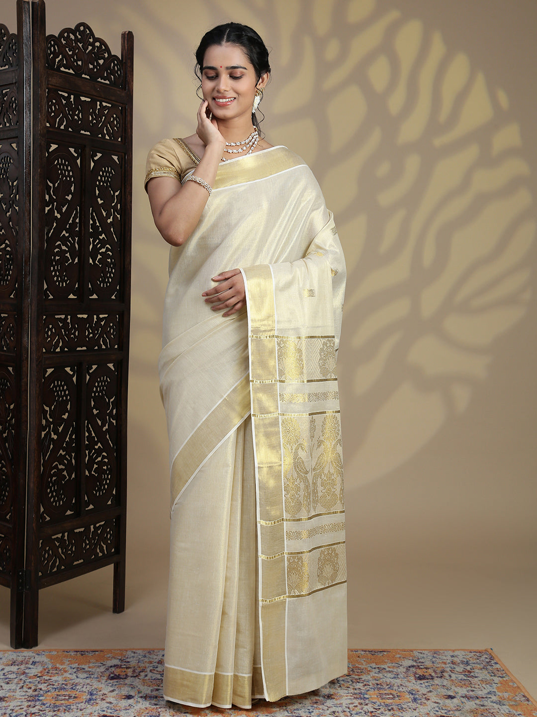 Women Traditional Kerala Tissue Gold Saree KS232