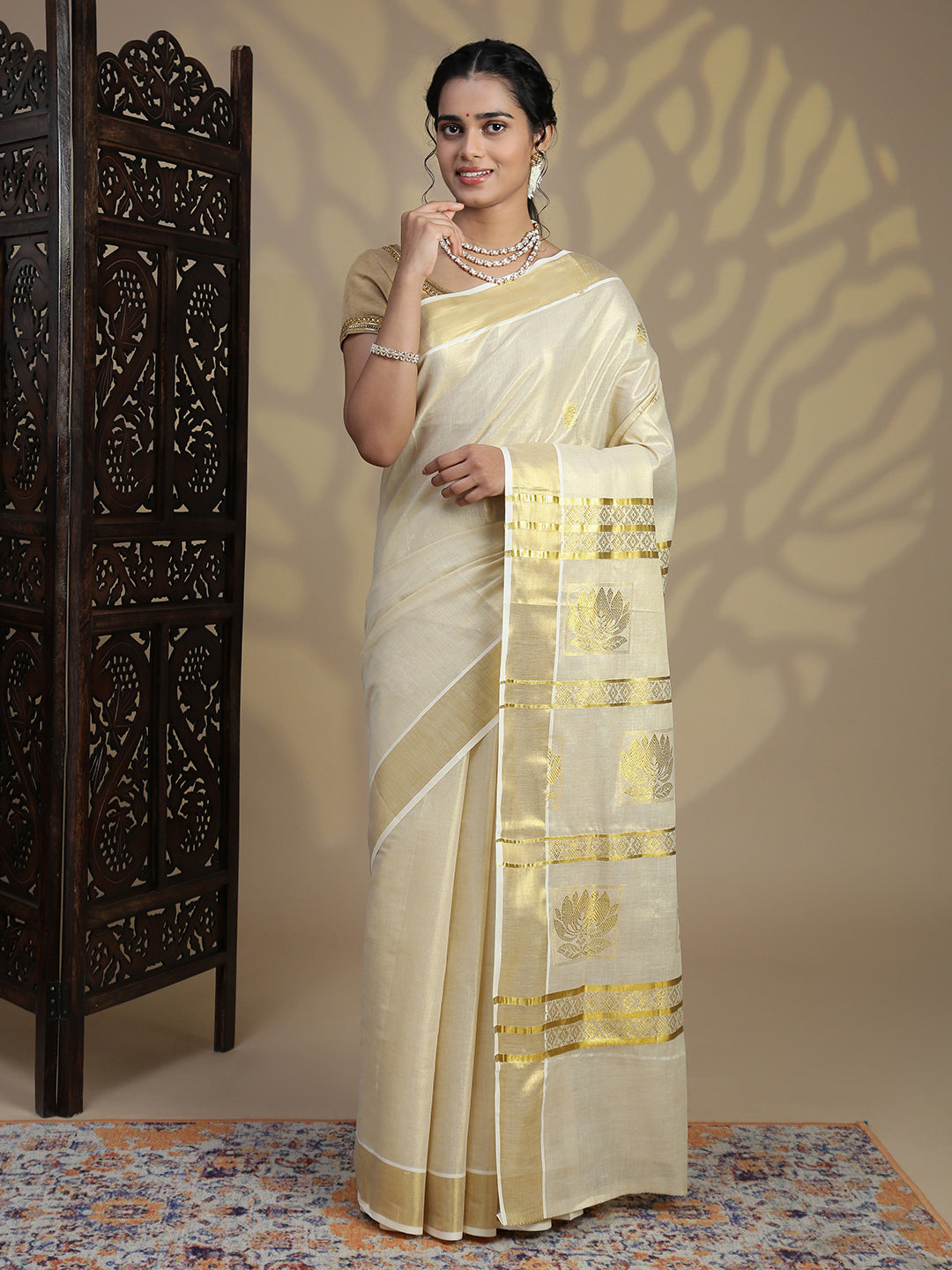 Women Traditional Kerala Tissue Gold Saree KS230