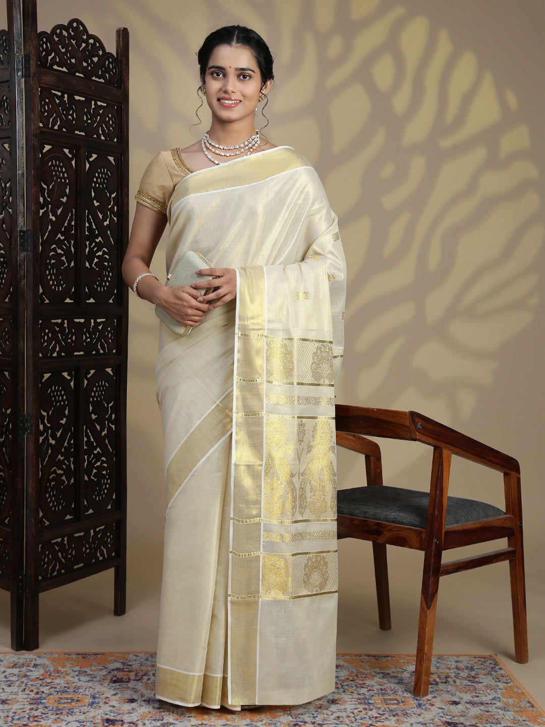 Women Traditional Kerala Tissue Gold Saree KS232