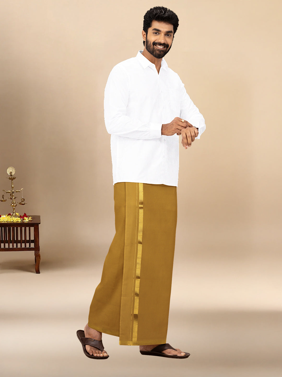 Men Cotton Blend Single Layer Mustard Dhoti with Gold Jari Border Cosmic