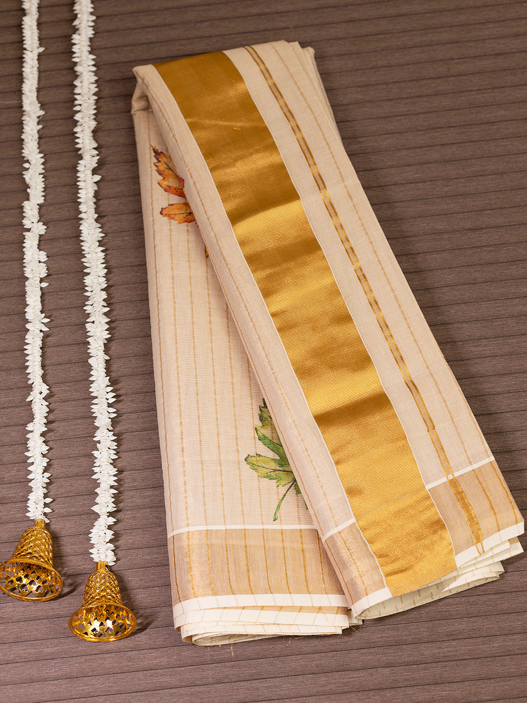 Women Kerala Tissue Gold Stripes with Leaf Design Saree KS179