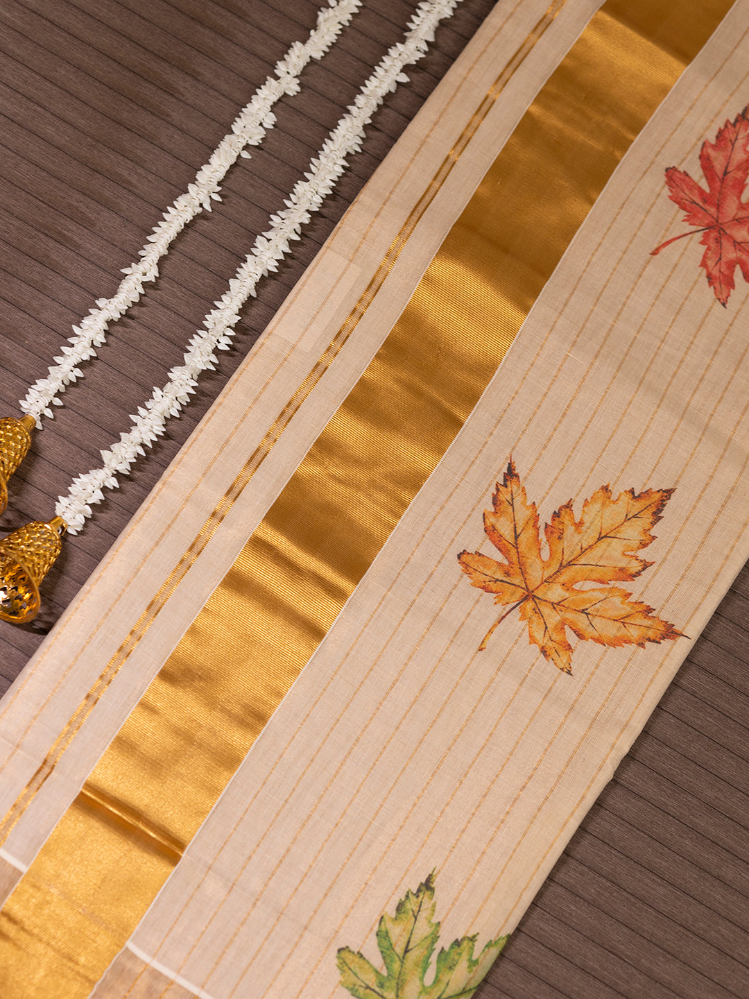 Women Kerala Tissue Gold Stripes with Leaf Design Saree KS179