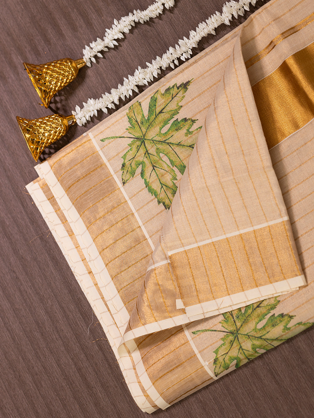 Women Kerala Tissue Gold Stripes with Leaf Design Saree KS179