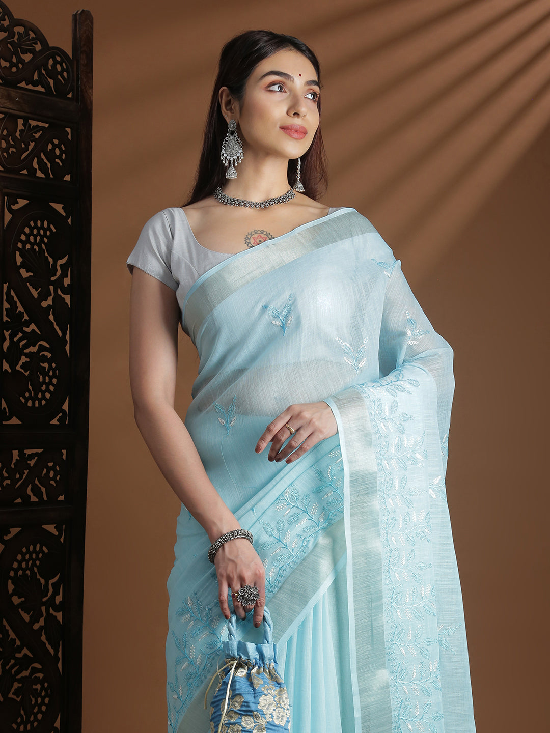 Women Light Blue Semi Linen Embroidered Saree SL246