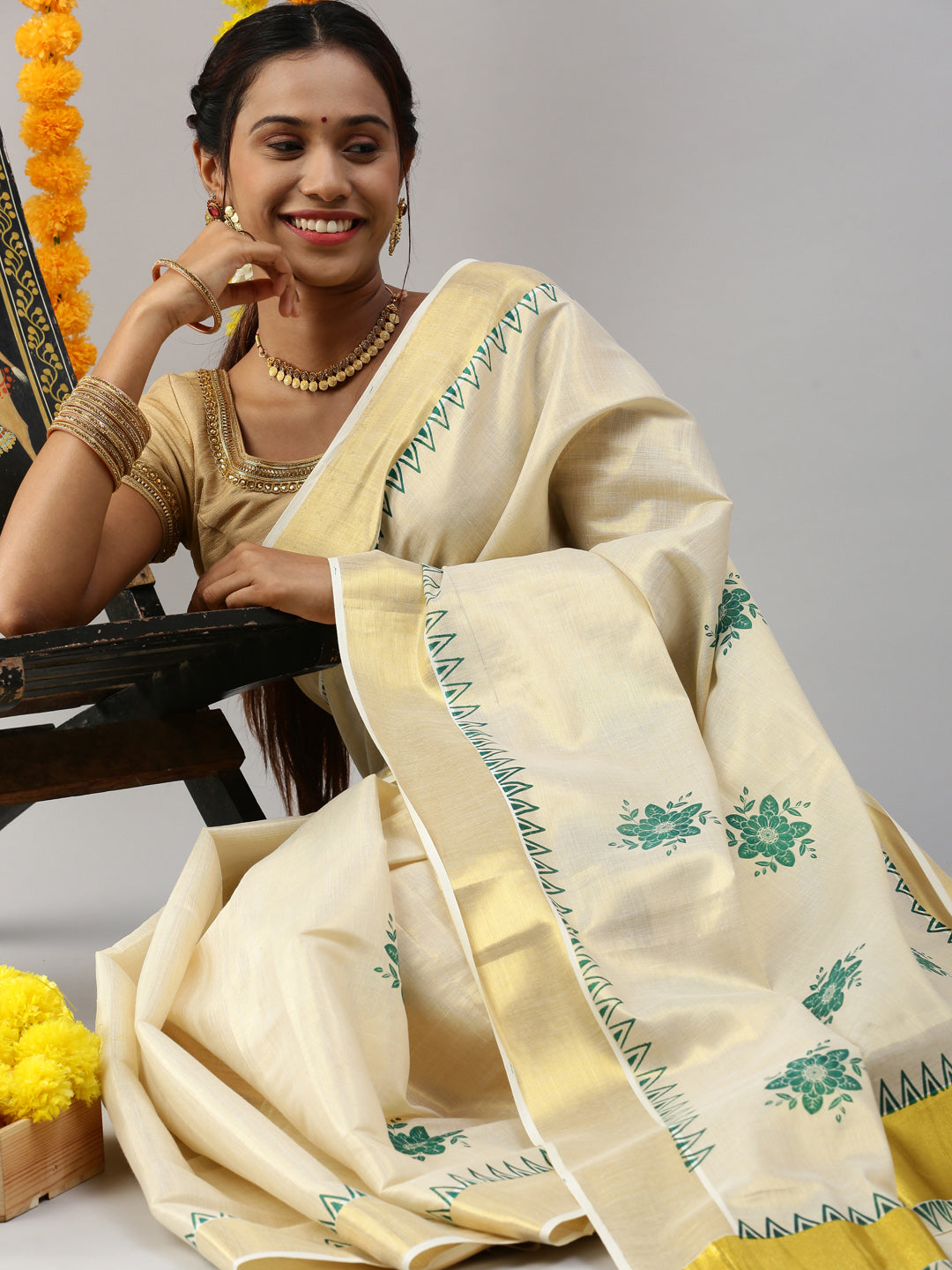 Womens Kerala Tissue Flower Printed Gold Jari & Green Border Saree OKS16-Sit view