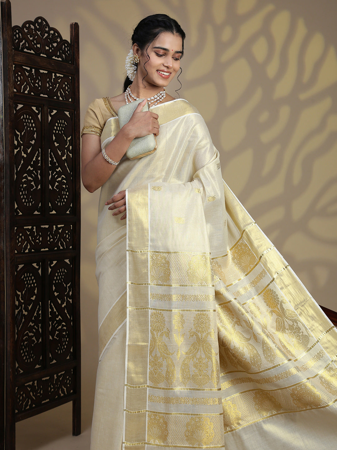 Women Traditional Kerala Tissue Gold Saree KS232