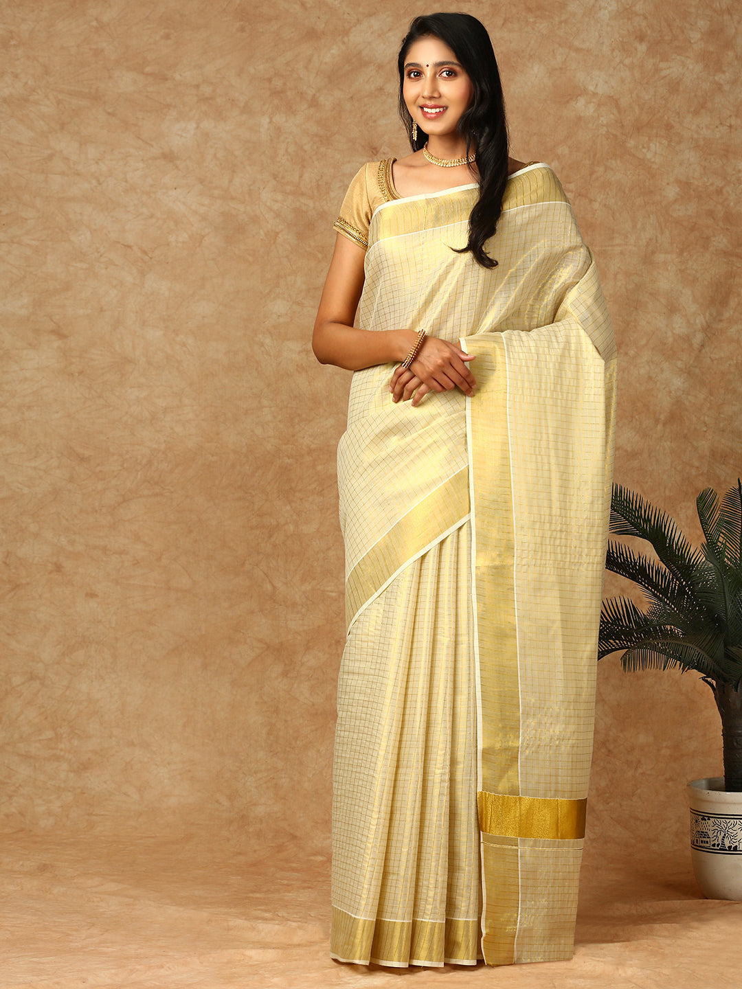 Kerala Cream Tissue Saree with Gold Jari Border KS131