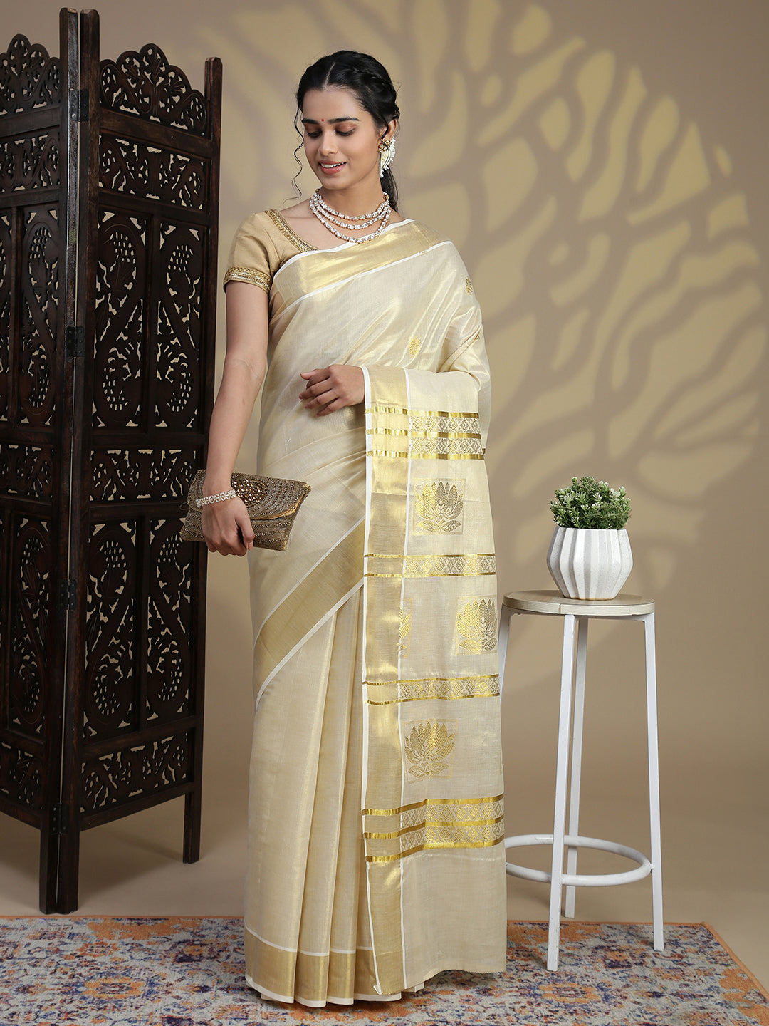Women Traditional Kerala Tissue Gold Saree KS230
