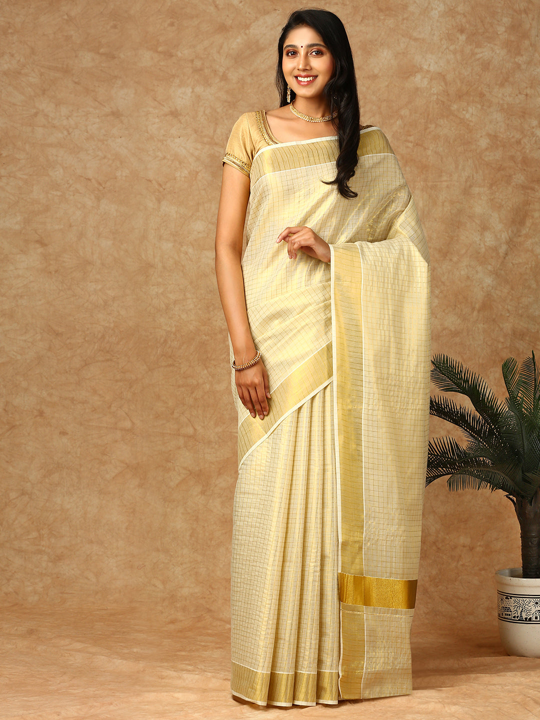 Kerala Cream Tissue Saree with Gold Jari Border KS131