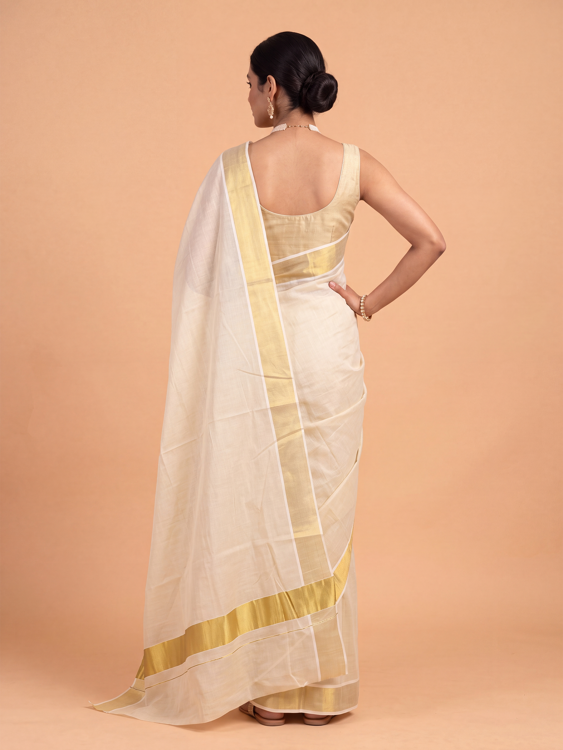 Women Tissue Kerala Saree with Gold Jari KLS52
